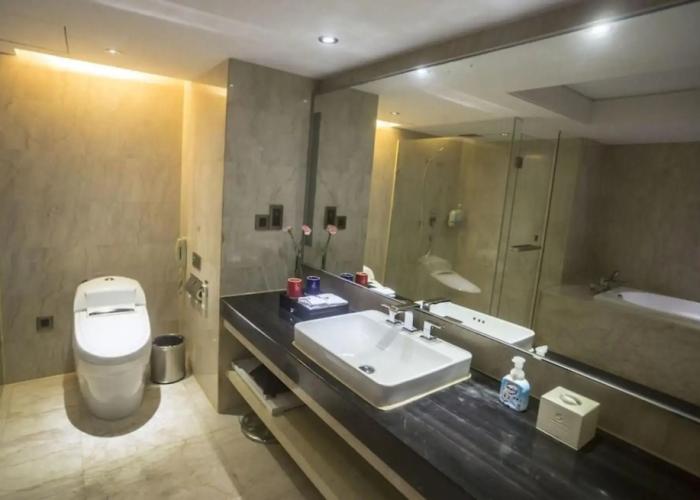 Manhattan Kinlen Hotel - Shishi