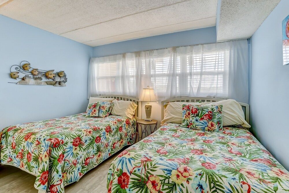 Updated Condo Featuring Fresh Atlantic Breeze by RedAwning