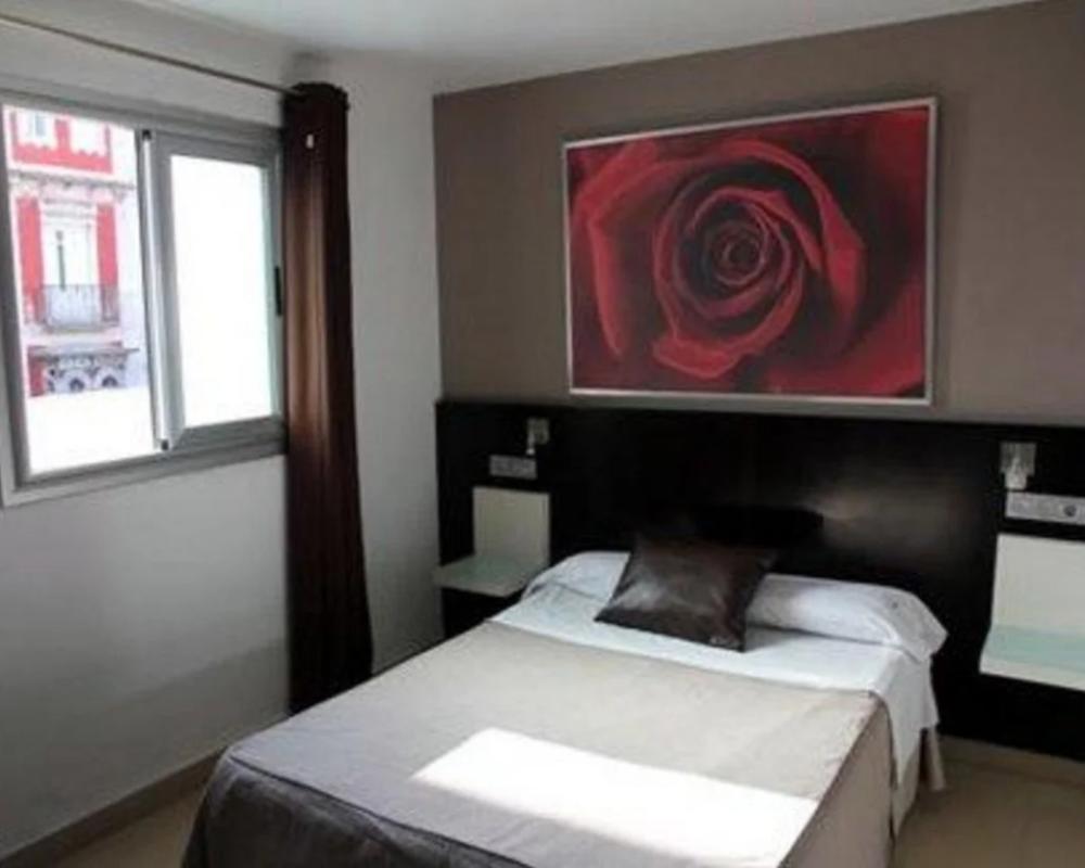 фото Hostal Central