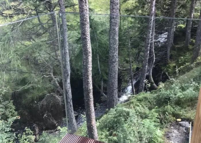 Red Stag With Stunning Loch and Waterfall View