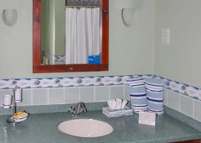 Spanish-style Ocean View Villa Set In Garden - Calypso Court 3 Bedroom Villa by RedAwning