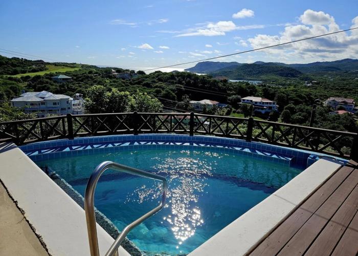 Charming Cottage Located In Cap Estate - Orchid Cottage 1 Bedroom Home by RedAwning