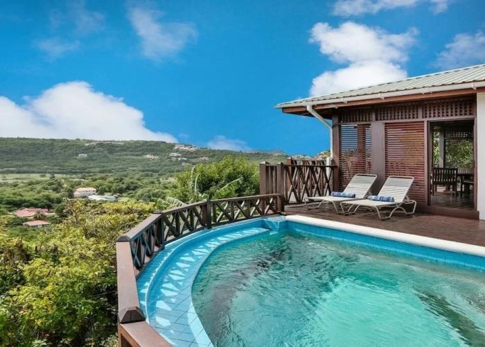 Charming Cottage Located In Cap Estate - Orchid Cottage 1 Bedroom Home by RedAwning