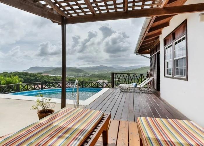 Charming Cottage Located In Cap Estate - Orchid Cottage 1 Bedroom Home by RedAwning