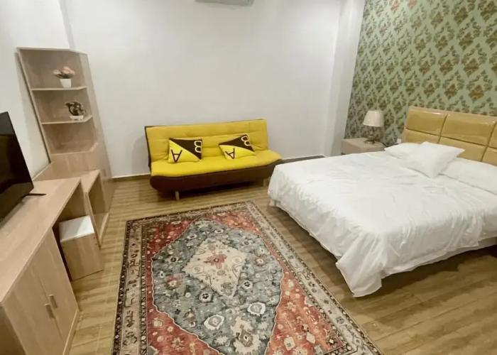 July Apartments