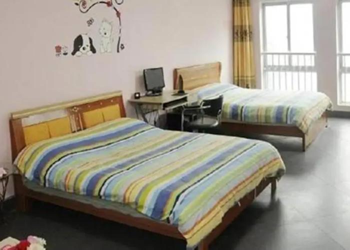 Huaxin Apartment Hotel
