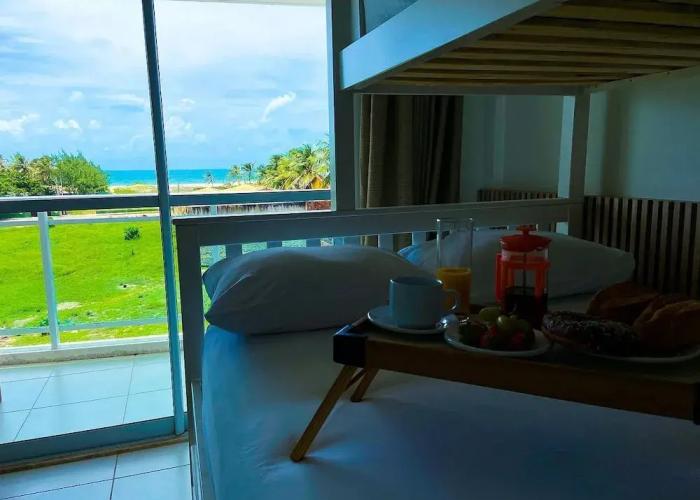 Apto vista mar incrível por Be My Guest