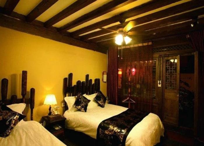 Lijiang Yunjin Yaju Courtyard Hotel