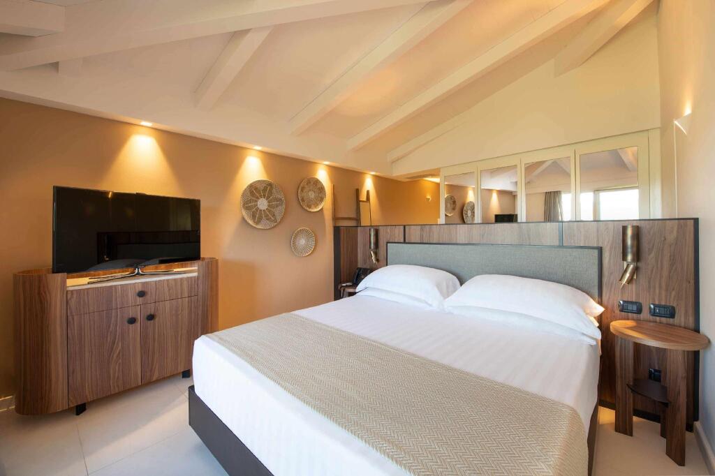 Baia di Chia Resort Sardinia, Curio Collection by Hilton