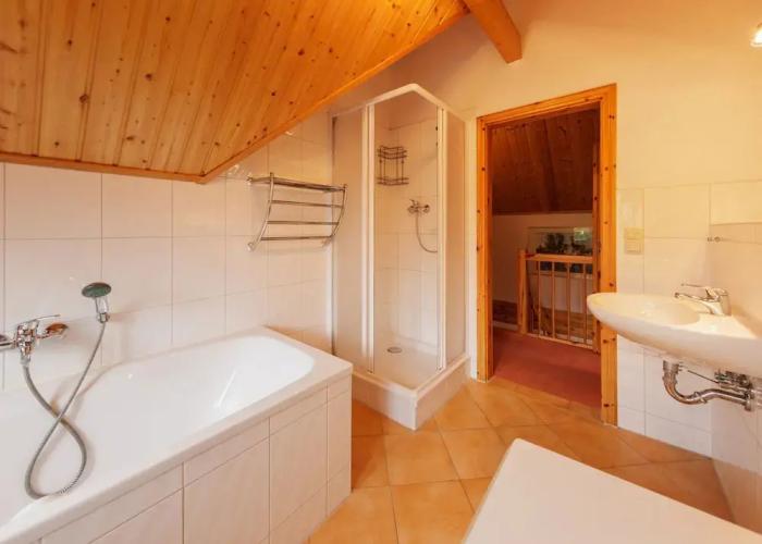 Cozy Holiday Home with Wood Burning Stove near Water