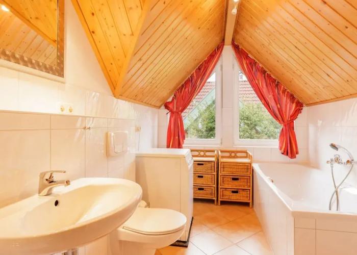 Cozy Holiday Home with Wood Burning Stove near Water