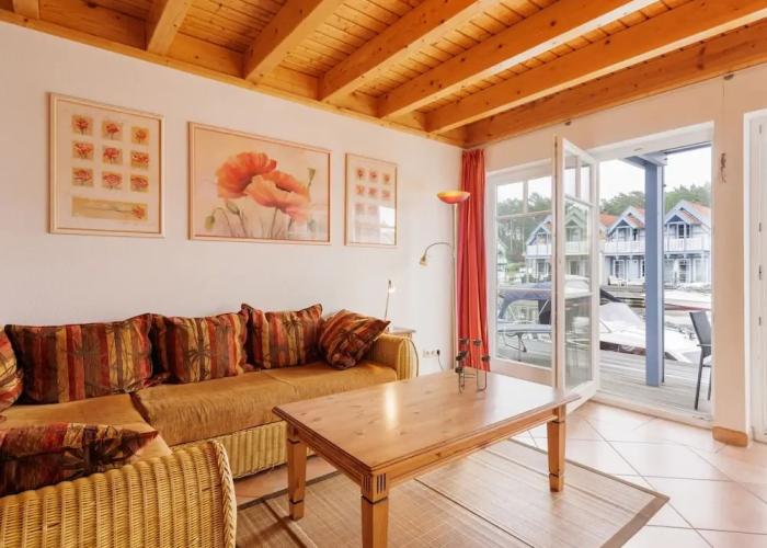 Cozy Holiday Home with Wood Burning Stove near Water
