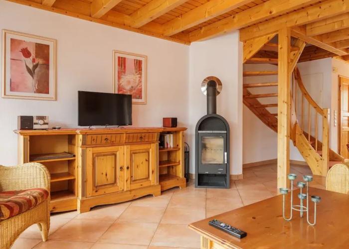 Cozy Holiday Home with Wood Burning Stove near Water