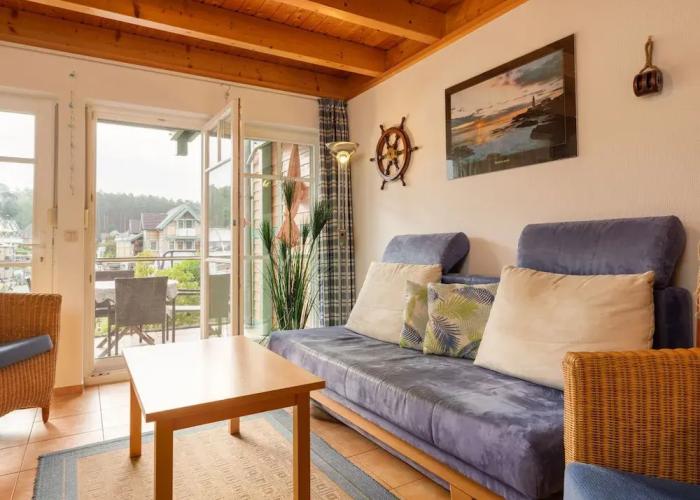 Cozy Holiday Home with Wood Burning Stove near Water