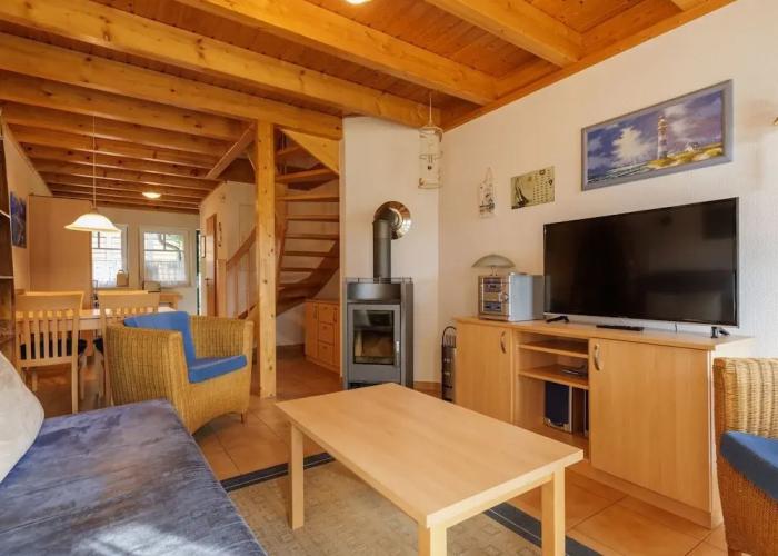 Cozy Holiday Home with Wood Burning Stove near Water