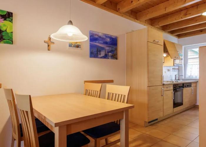 Cozy Holiday Home with Wood Burning Stove near Water