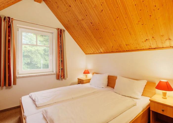 Cozy Holiday Home with Wood Burning Stove near Water