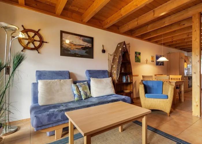 Cozy Holiday Home with Wood Burning Stove near Water