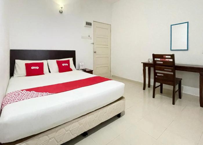 OYO 275 Senyum Inn