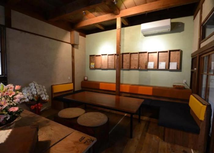 Taketa station hostel cue