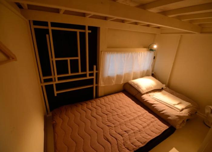 Taketa station hostel cue