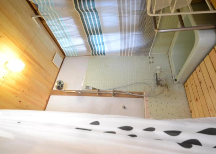 Taketa station hostel cue