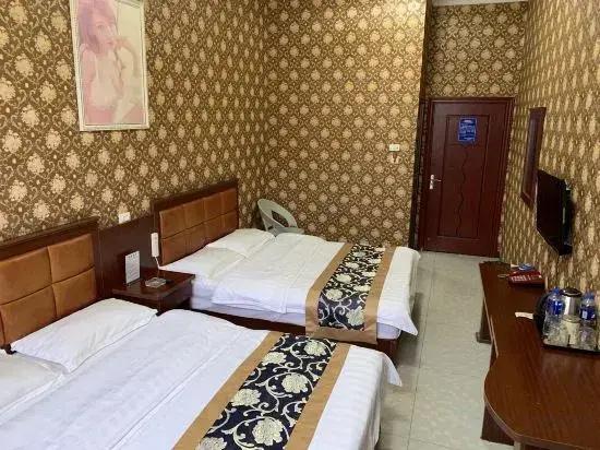 Qujing Ruixin Business Hotel