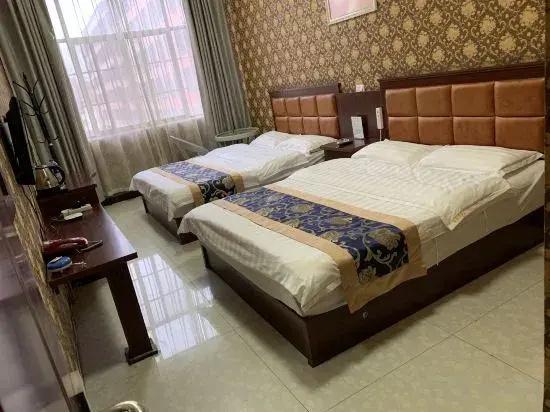 Qujing Ruixin Business Hotel