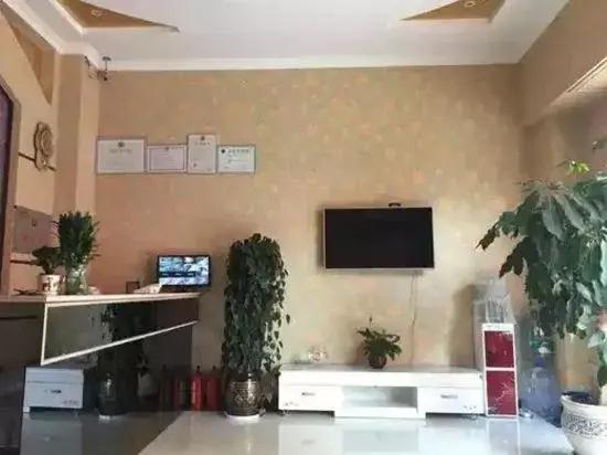 Qujing Ruixin Business Hotel