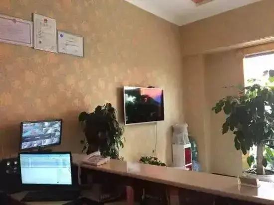 Qujing Ruixin Business Hotel