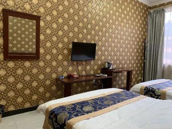 Qujing Ruixin Business Hotel