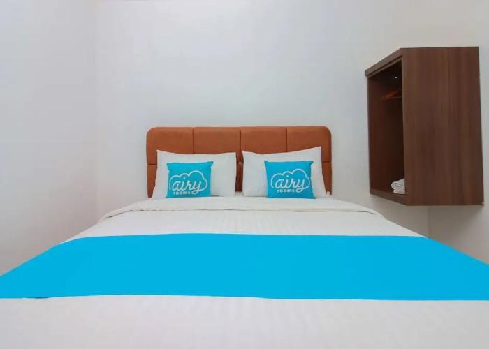 Airy Mapanget AA Maramis Manado