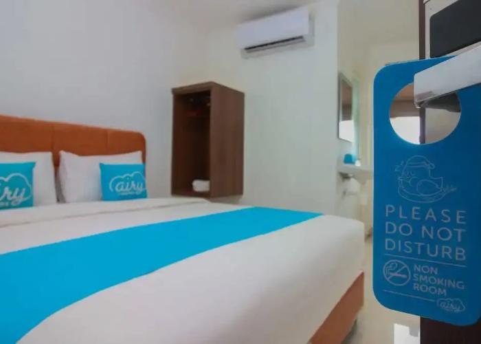 Airy Mapanget AA Maramis Manado