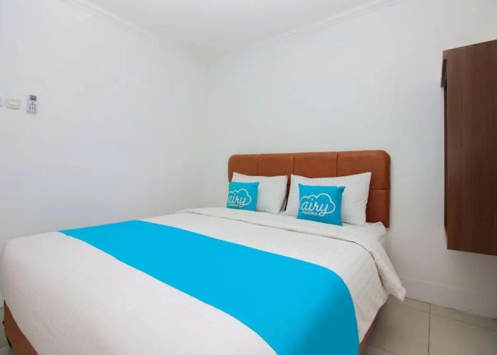 Airy Mapanget AA Maramis Manado