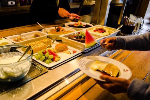 Frich's Motell & Spiseri Rudshøgda AS