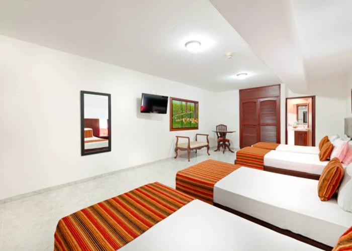 TAMA Hotel Granada Real Cali