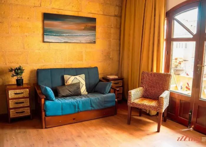 A Pretty Duplex Apartment in a Gozo Village Square