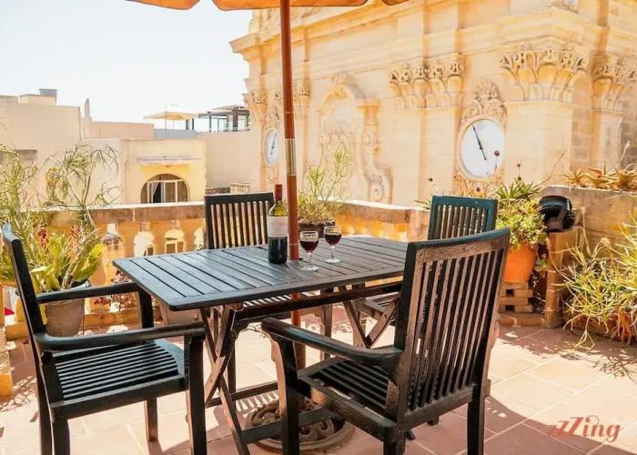 A Pretty Duplex Apartment in a Gozo Village Square