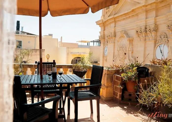 A Pretty Duplex Apartment in a Gozo Village Square