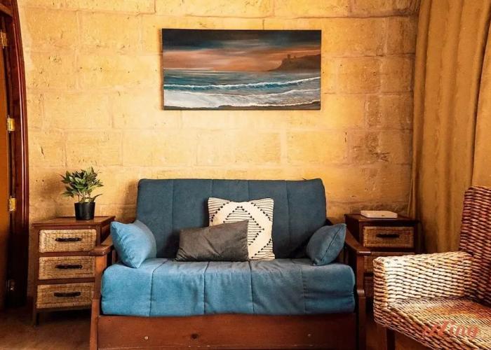 A Pretty Duplex Apartment in a Gozo Village Square