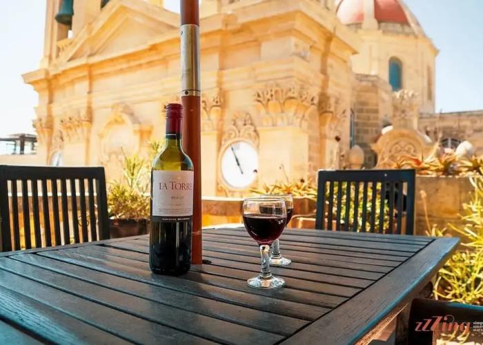 A Pretty Duplex Apartment in a Gozo Village Square