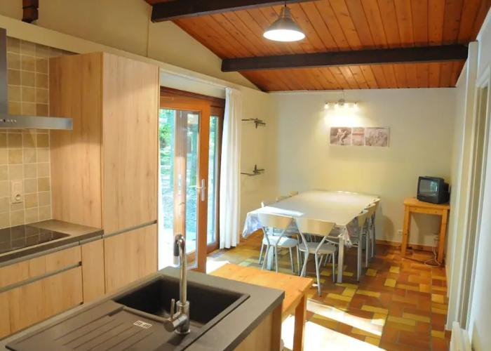 Wooden Chalet With Stove and Microwave Located in the Forest