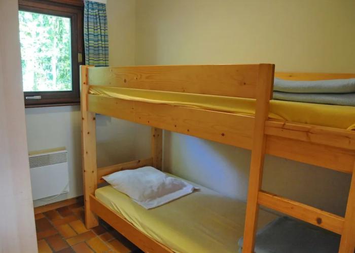 Wooden Chalet With Stove and Microwave Located in the Forest