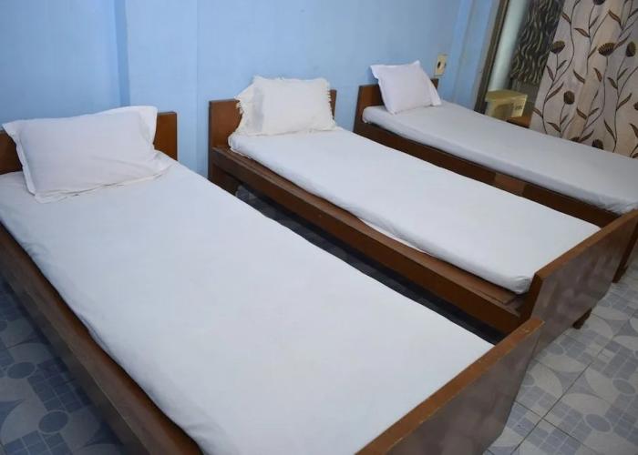 Parisha Residency - Temple Side Hotel