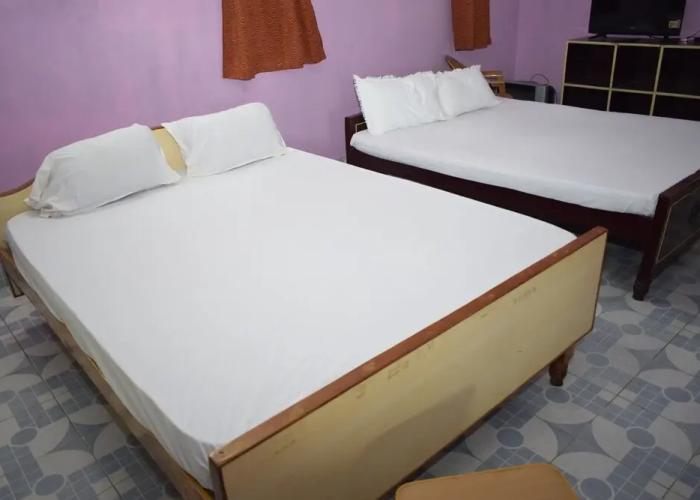 Parisha Residency - Temple Side Hotel
