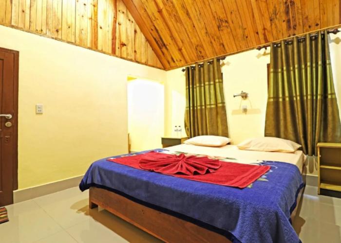 Tuk Tuk Timbul Bungalows