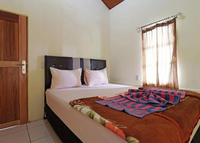 Tuk Tuk Timbul Bungalows