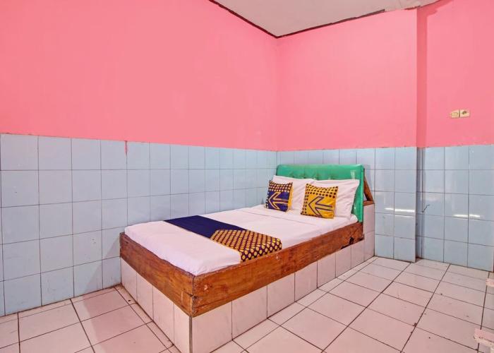 SPOT ON 92791 4 Saudara Hotel