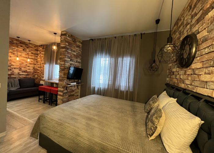 With Clock in Loft Style Apartment