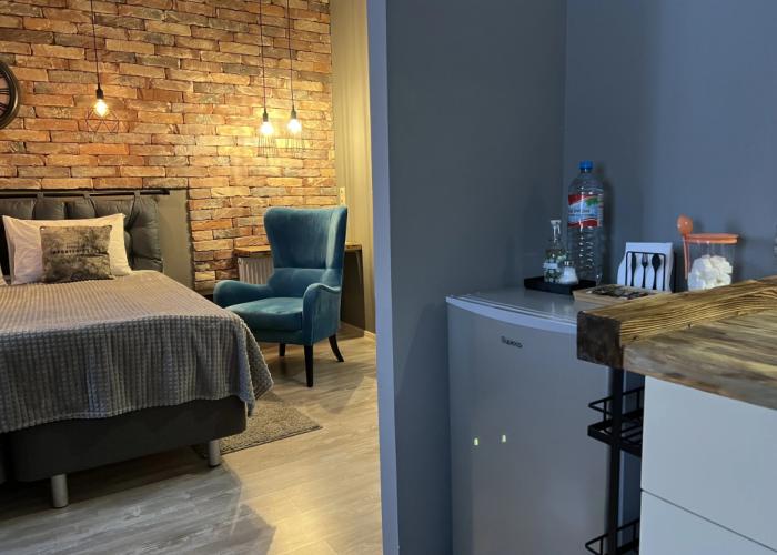 With Clock in Loft Style Apartment